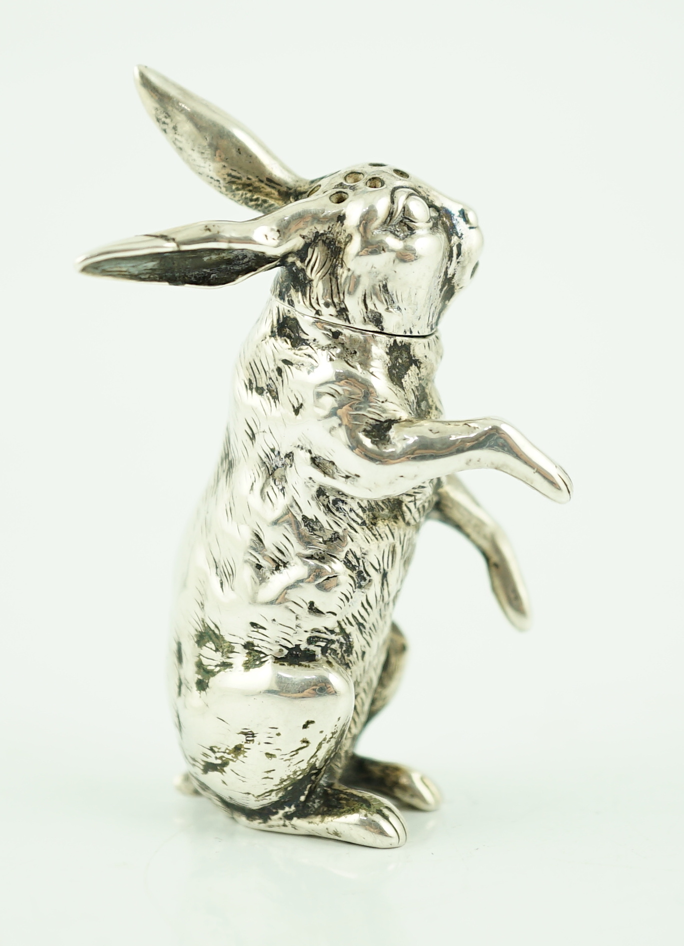 An early 20th century Russian? 84 zolotnik novelty pepperette, modelled as a rabbit